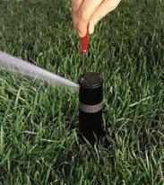 a Hunter sprinkler head adjustment